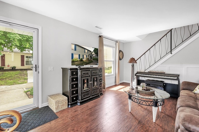 2993 Maplewood, Lake Orion, MI 48360 - living area with visible vents, baseboards, wood finished floors, and stairway