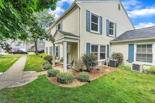 2993 Maplewood, Lake Orion, MI 48360 - view of property exterior with a lawn and central air condition unit