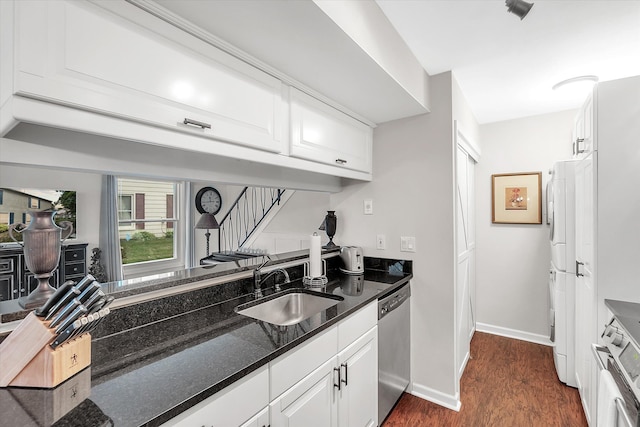 2993 Maplewood, Lake Orion, MI 48360 - kitchen featuring dark stone counters, white cabinetry, a sink, dark wood finished floors, and dishwasher