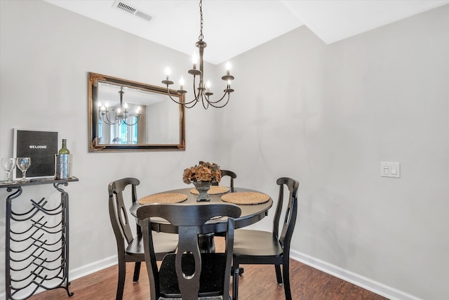 2993 Maplewood, Lake Orion, MI 48360 - dining area with baseboards, wood finished floors, a chandelier, and visible vents