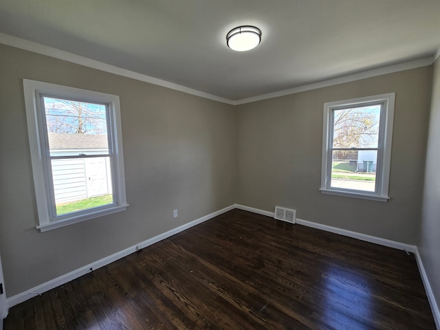 1606 Mill St, Lincoln Park, MI 48146 - empty room with dark wood-style floors and crown molding