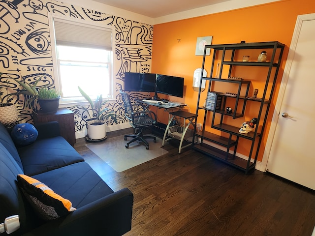 office space with baseboards, wood finished floors, and wallpapered walls