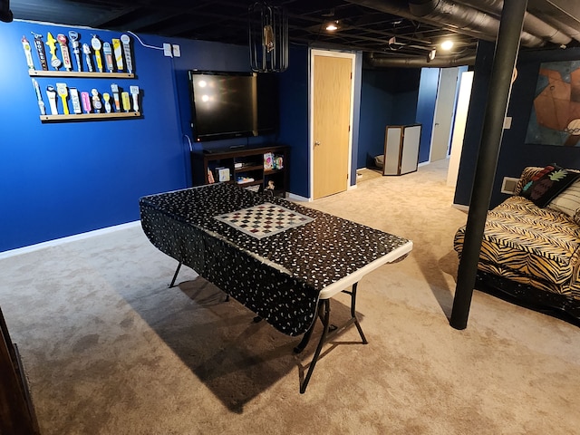 finished basement with carpet floors and baseboards