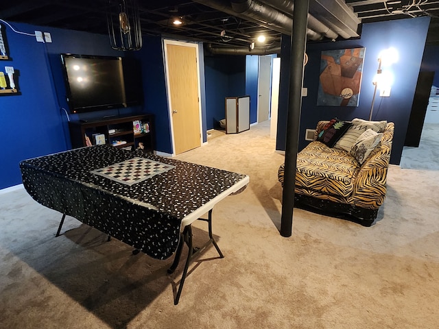 finished basement featuring carpet flooring