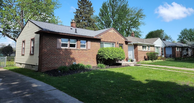 view of front of house with brick siding, a chimney, and a shingled roof
