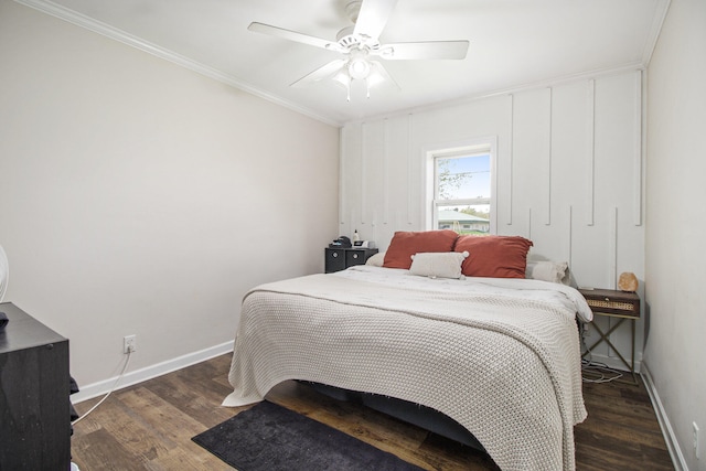 bedroom with ceiling fan, baseboards, ornamental molding, and wood finished floors