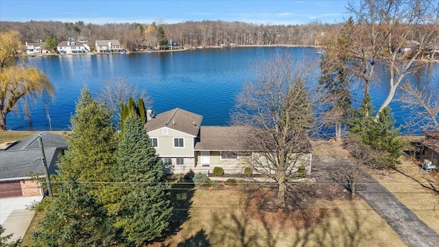 bird's eye view with a water view