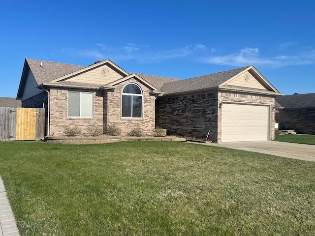 46132 Royal Dr, Chesterfield, MI 48051 - ranch-style house with a garage, a front lawn, fence, brick siding, and driveway