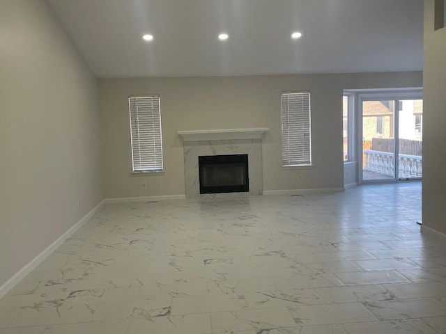 46132 Royal Dr, Chesterfield, MI 48051 - unfurnished living room with baseboards, marble finish floor, and a fireplace