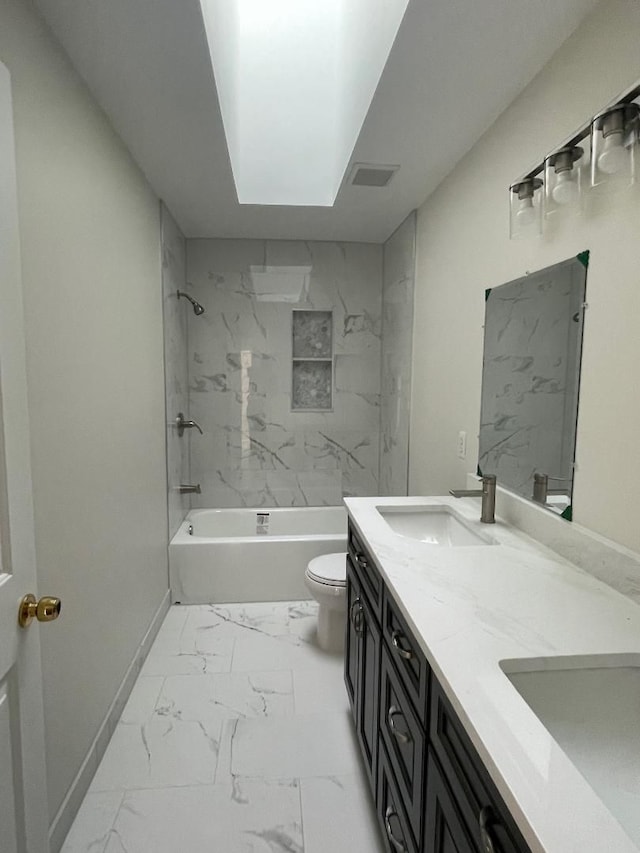 46132 Royal Dr, Chesterfield, MI 48051 - full bathroom featuring double vanity, marble finish floor, toilet, bathing tub / shower combination, and a sink