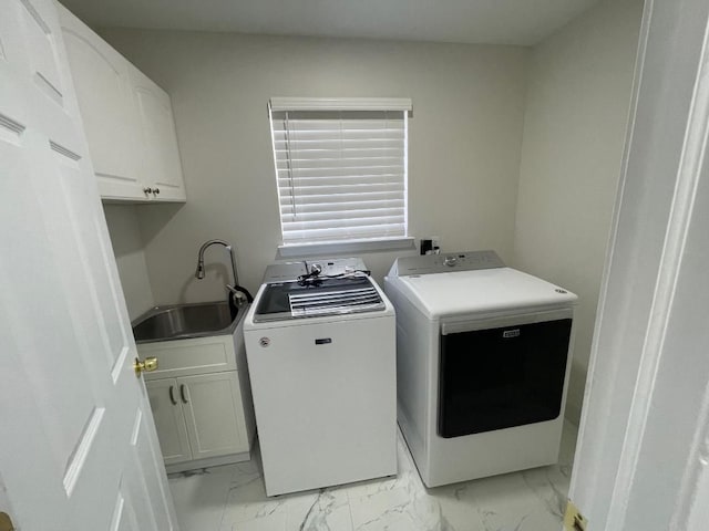 46132 Royal Dr, Chesterfield, MI 48051 - washroom featuring a sink, cabinet space, marble finish floor, and washer and clothes dryer