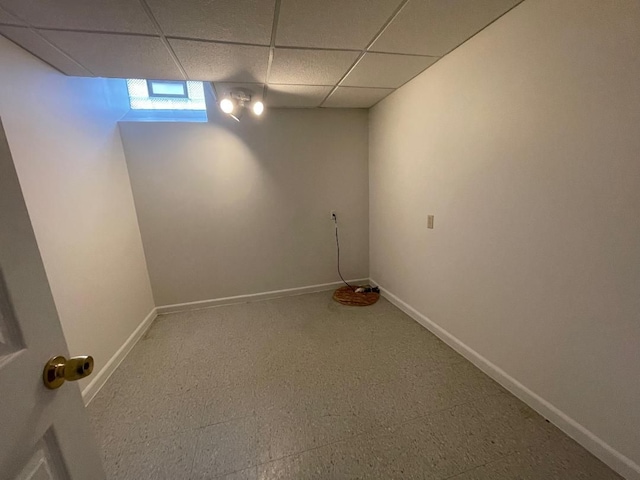46132 Royal Dr, Chesterfield, MI 48051 - basement with baseboards and a drop ceiling