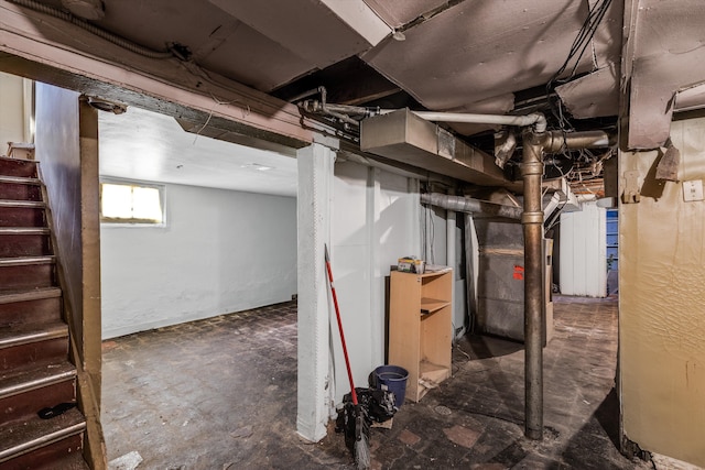 basement featuring stairway
