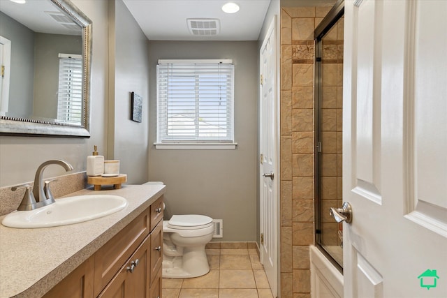 full bathroom featuring tile patterned floors, visible vents, toilet, and vanity