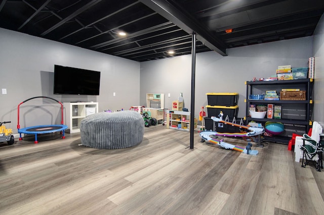 playroom with wood finished floors