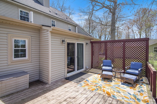 wooden terrace featuring outdoor lounge area