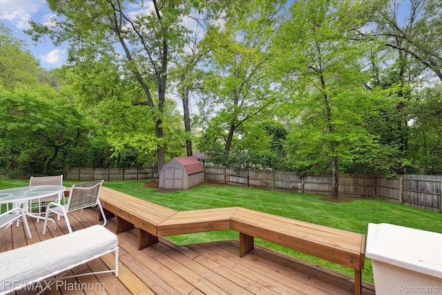 11520 Weiman Dr, Pinckney, MI 48169 - wooden deck with outdoor dining area and view of wooded area