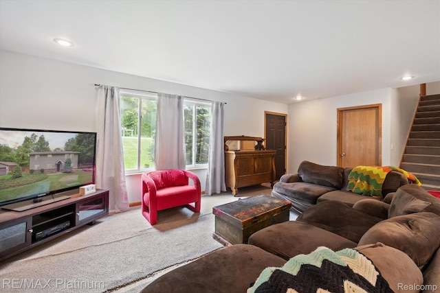 11520 Weiman Dr, Pinckney, MI 48169 - carpeted living area with stairway and recessed lighting