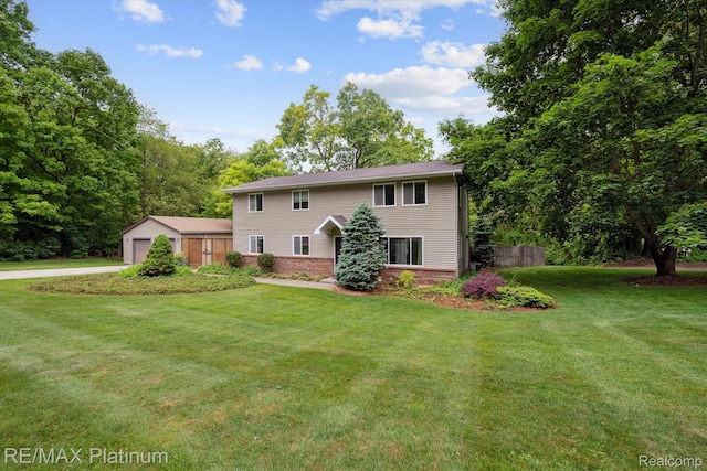 11520 Weiman Dr, Pinckney, MI 48169 - colonial-style house with brick siding