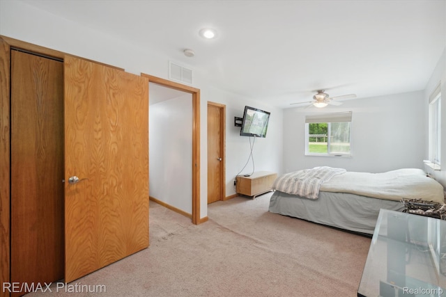 11520 Weiman Dr, Pinckney, MI 48169 - bedroom with light carpet, baseboards, and a ceiling fan