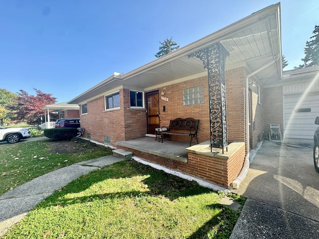 17314 Veronica Ave, Eastpointe, MI 48021 - view of property exterior with a lawn and brick siding