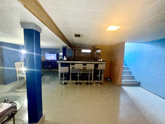 17314 Veronica Ave, Eastpointe, MI 48021 - basement featuring visible vents, stairway, and bar area