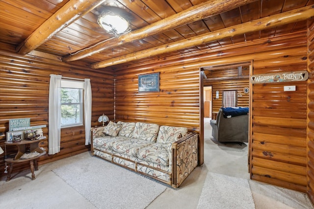 3895 Pine St, Glennie, MI 48737 - carpeted living room with wood ceiling, beam ceiling, and log walls
