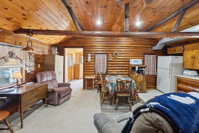 3895 Pine St, Glennie, MI 48737 - dining area featuring log walls, wood ceiling, and light carpet