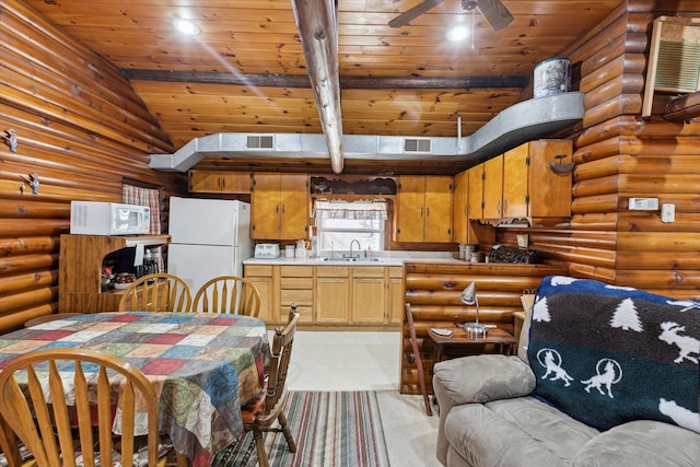 3895 Pine St, Glennie, MI 48737 - kitchen featuring white appliances, a sink, wood ceiling, light countertops, and vaulted ceiling