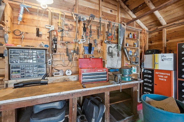 3895 Pine St, Glennie, MI 48737 - miscellaneous room featuring a workshop area, wood walls, and wood ceiling