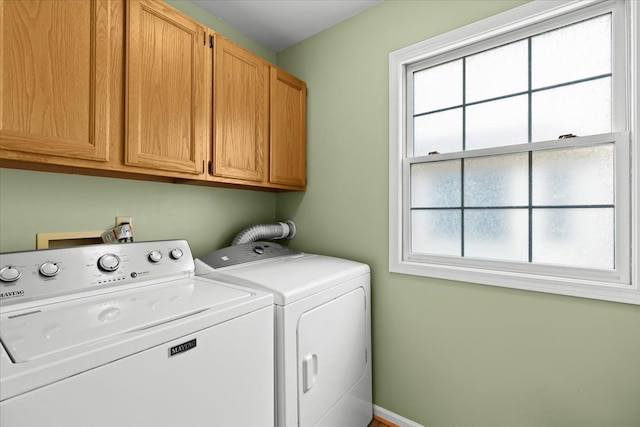 514 Mill Pond Dr, Fenton, MI 48430 - laundry area featuring plenty of natural light, cabinet space, and independent washer and dryer