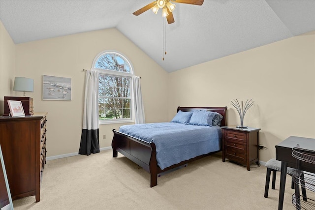 514 Mill Pond Dr, Fenton, MI 48430 - bedroom featuring baseboards, light carpet, ceiling fan, and vaulted ceiling