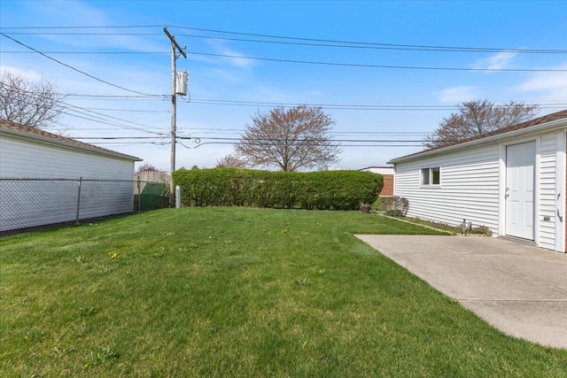 view of yard with fence and a patio area