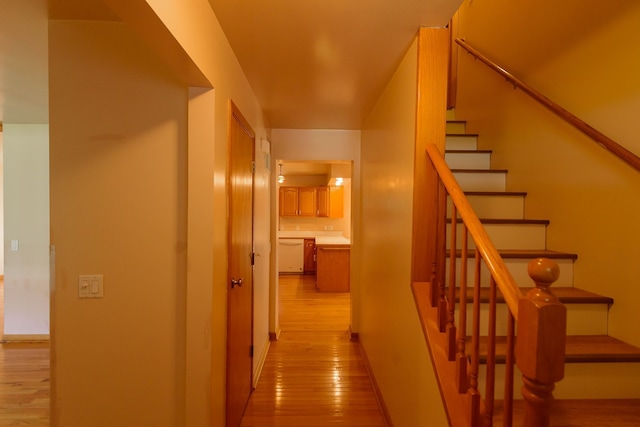 hall featuring stairway and light wood finished floors