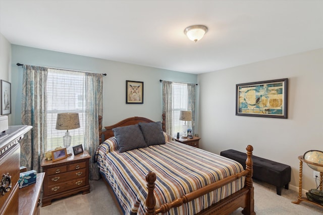 bedroom with light carpet