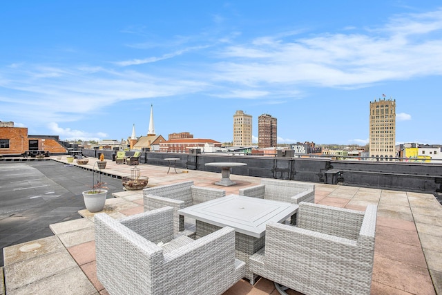 view of patio / terrace featuring a city view
