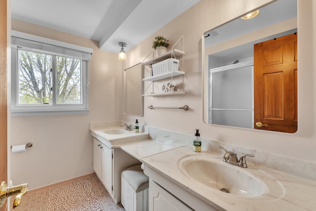 full bathroom with tile patterned flooring, an enclosed shower, and vanity
