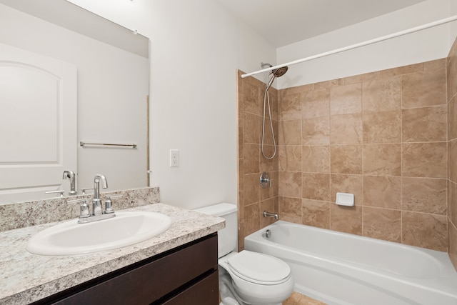 bathroom with toilet, shower / tub combination, and vanity