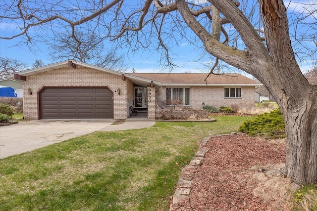 ranch-style home with a front yard, roof with shingles, brick siding, concrete driveway, and an attached garage