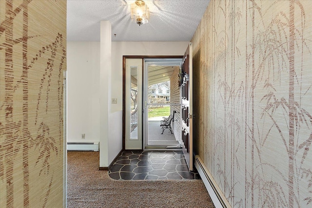 entryway with baseboards, a baseboard radiator, dark carpet, and a textured ceiling