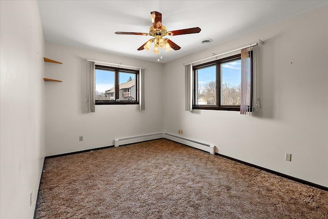 unfurnished room with baseboards, carpet flooring, ceiling fan, and a wealth of natural light