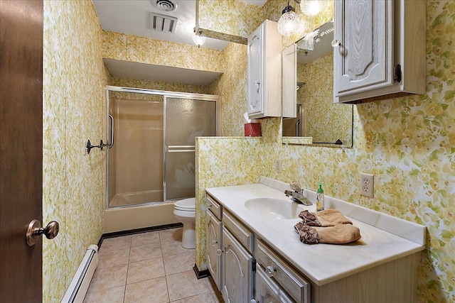 full bathroom with tile patterned flooring, vanity, a baseboard heating unit, toilet, and wallpapered walls