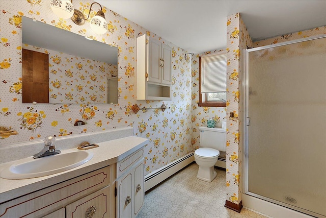 full bathroom featuring vanity, a baseboard radiator, a stall shower, and toilet