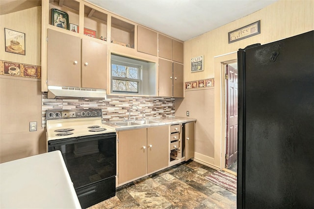 kitchen featuring a sink, under cabinet range hood, black appliances, backsplash, and light countertops