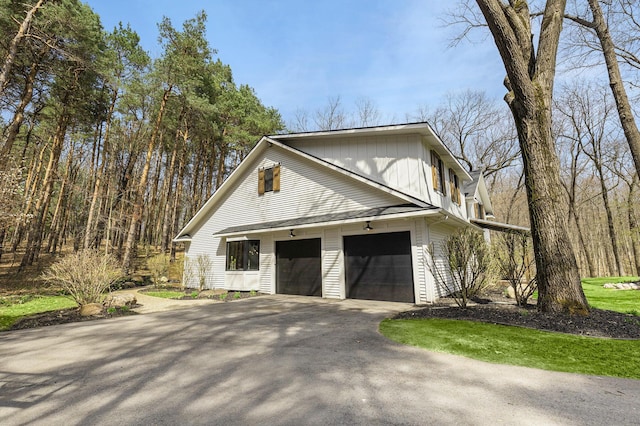 view of property exterior with driveway