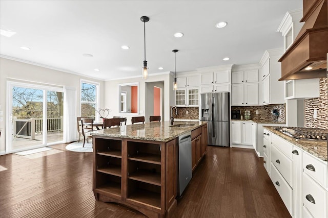 kitchen with crown molding, open shelves, a sink, stainless steel appliances, and custom range hood