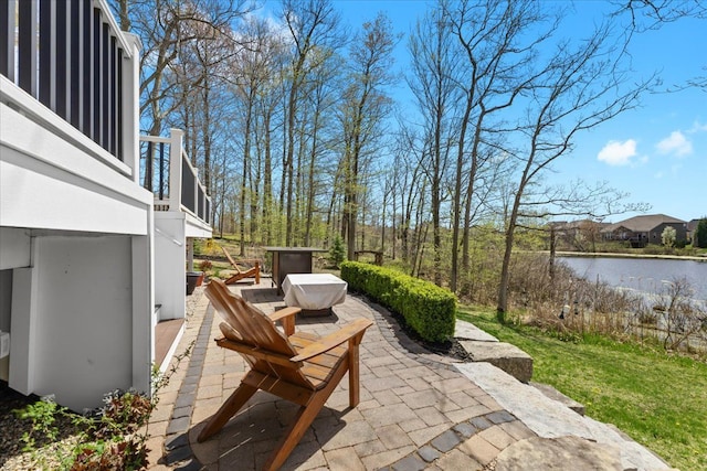 view of patio / terrace with a water view