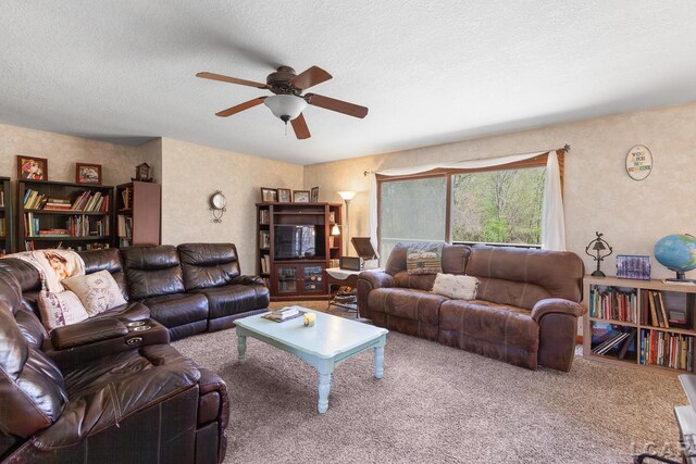 3620 Sharp Rd, Adrian, MI 49221 - carpeted living area featuring a ceiling fan and a textured ceiling