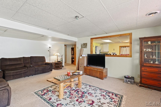 3620 Sharp Rd, Adrian, MI 49221 - carpeted living area featuring visible vents and a drop ceiling