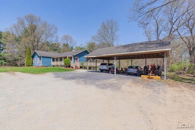 3620 Sharp Rd, Adrian, MI 49221 - view of vehicle parking with driveway and a carport